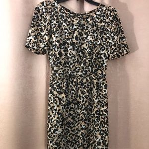 Cute dress, with drawstring detail in back!